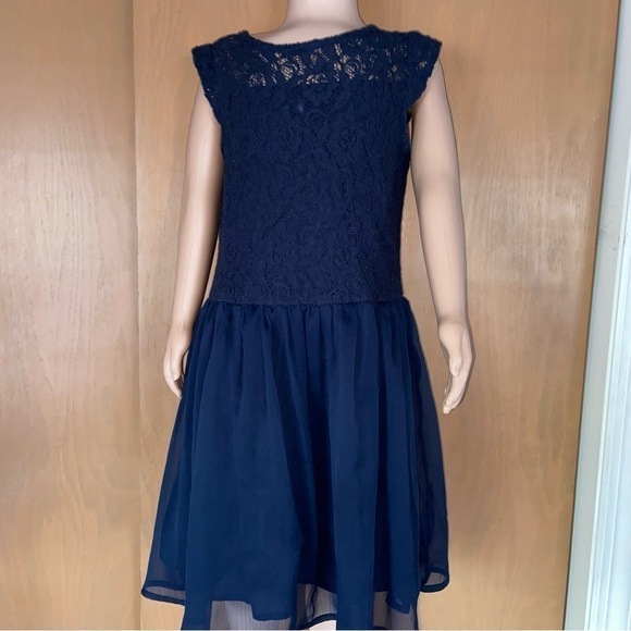 Guess Los Angeles baby lace dress has a gauze skirt just perfect for twirling. - Picture 1 of 8